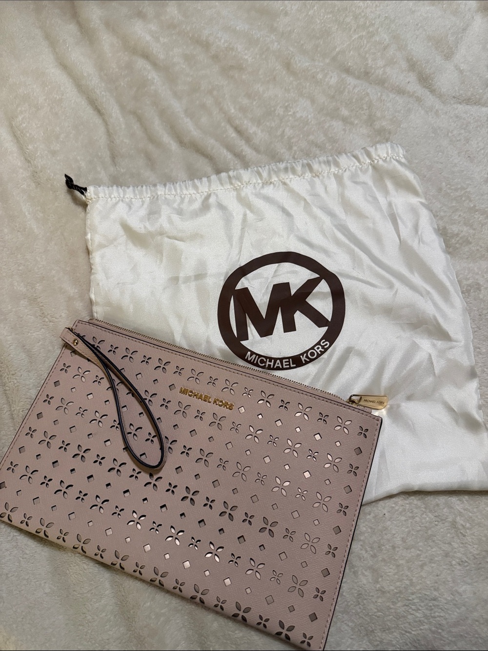 Michael Kors Blush Perforated Wristlet Clutch